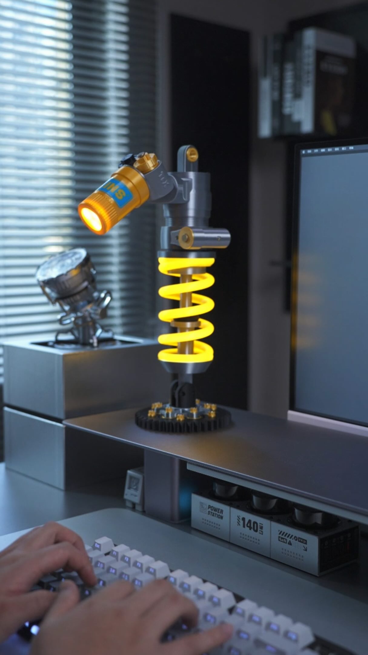 Mechanical desk lamp photographed in a controlled dark studio
